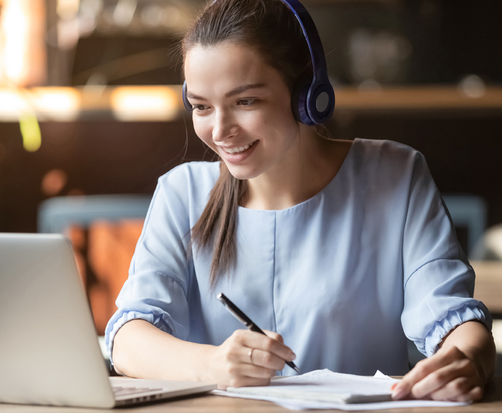 Woman enjoys business training through an online session.